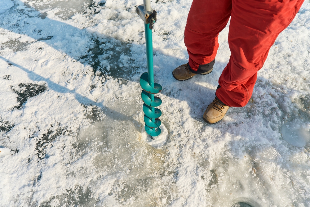 using an ice auger 