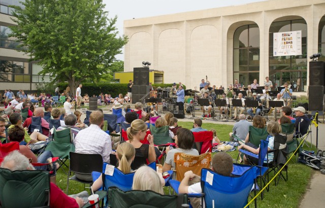 crowd in lawn chairs