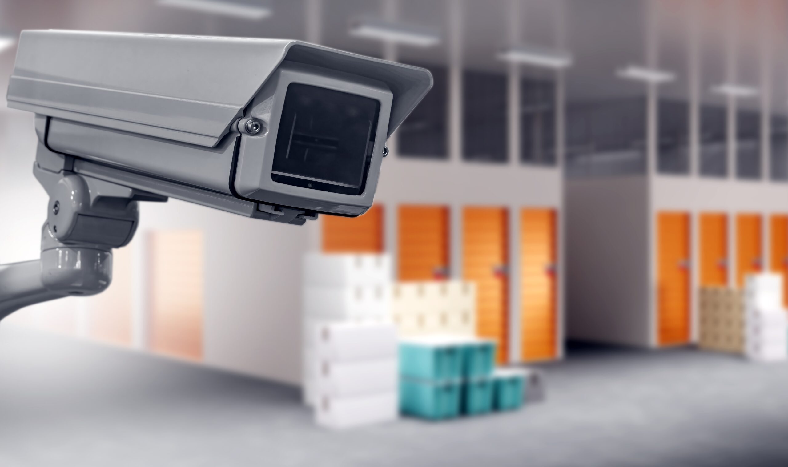 Indoor self storage units in a hallway with surveillance camera